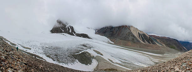 istock Tian Shan mountains snow peaks high resolution wide angle panoramic landscape. Huge glacier and snow summits in Pamir mountains 2237424496