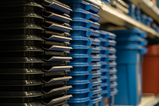 istock Stacked plastic storage bins with lids in hardware store aisle. 2237424984