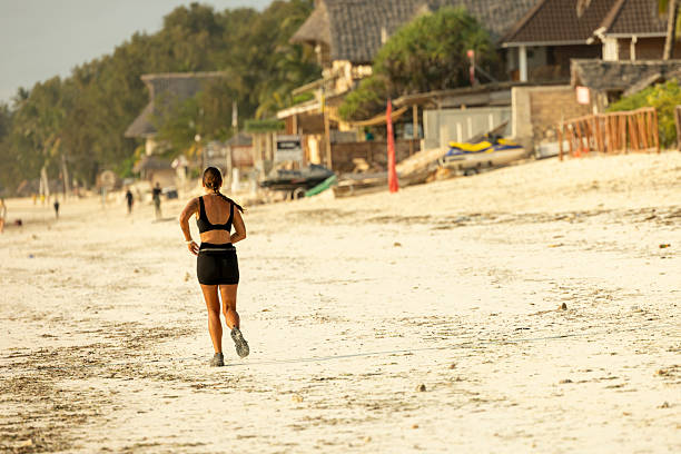 A woman running on the beach