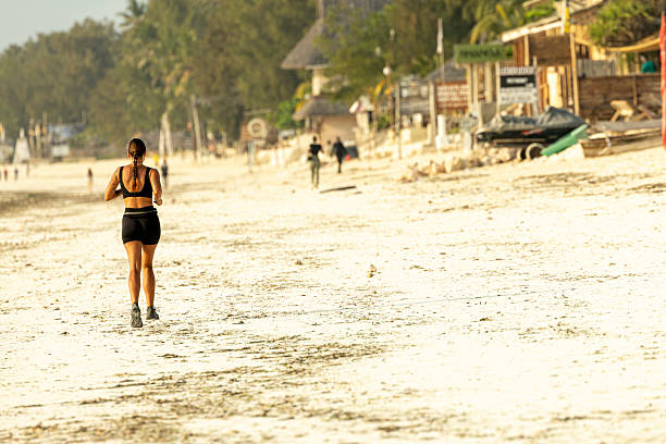 A woman running on the beach