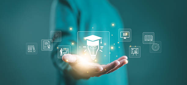 istock Digital education concept with graduation cap and light bulb, symbolizing innovation, learning, online training, e-learning, business knowledge, career development, and academic success. 2237443480