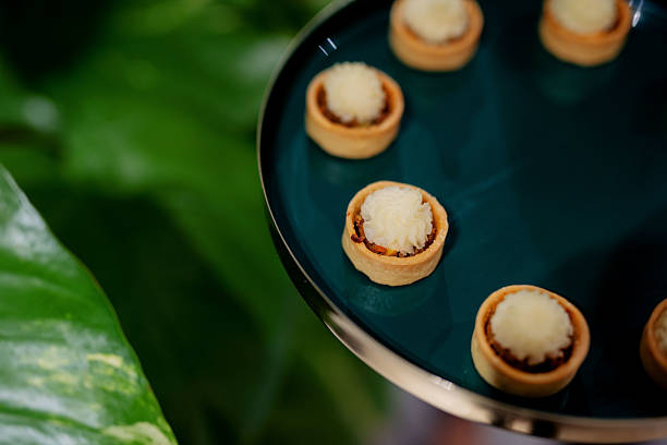 Mini Lamb Shepherd's Pie Appetizers Canape on Dark Turquoise and Gold Tray