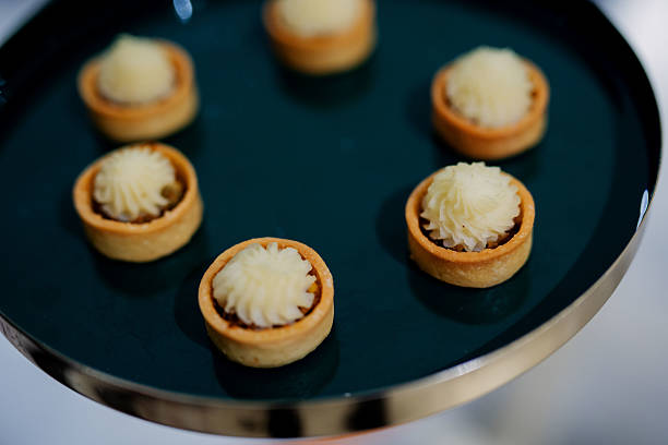 Mini Lamb Shepherd's Pie Appetizers Canape on Dark Turquoise and Gold Tray