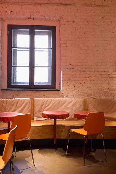 istock Modern Caf Interior with Cozy Seating and Natural Light 2237444971
