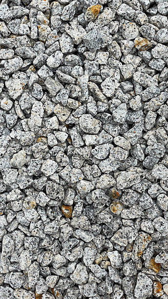 istock Granite stone texture background with uniformly crushed grains suitable for flooring, symbolizing durability, 2237445710