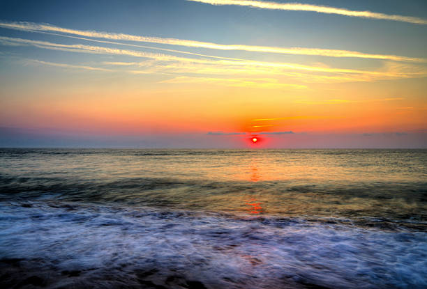 Beautiful summer sunrise over the beach