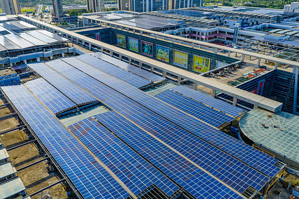 istock Solar photovoltaic panels on a city rooftop 2237452942