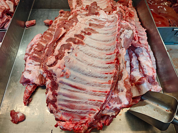 istock Fresh Pork Cuts on Display at Butcher Shop for Purchase and Cooking 2237453528