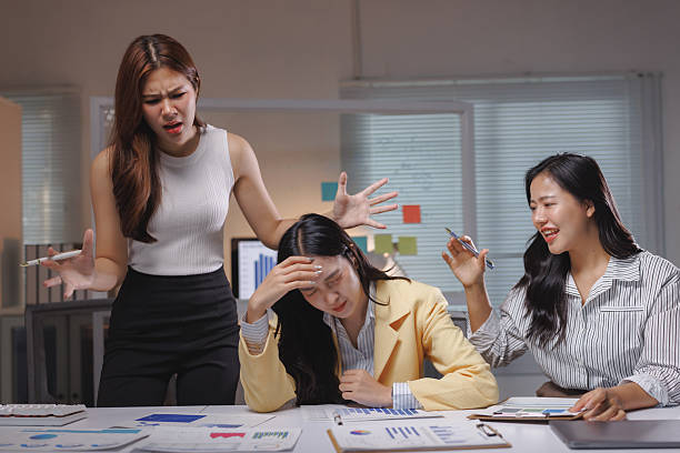 istock Stressed businesswomen dealing with conflict and workplace pressure 2237455436