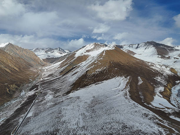 istock Magnificent Scenery of Snow-Capped Mountains and Valleys 2237456007
