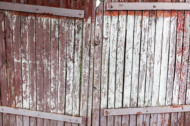 A wooden door with a white stripe on it