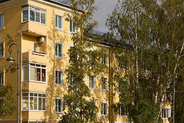 istock A modernstyle residential building elegantly surrounded by lush trees and greenery 2237462038