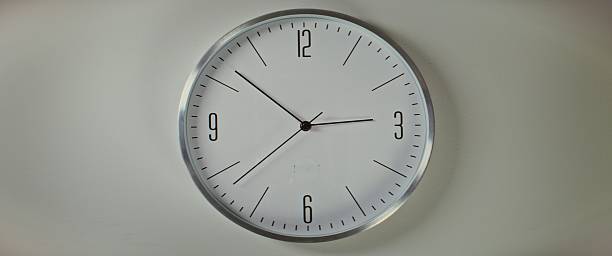 istock Time Lapse: Close Up of Minimalist Wall Clock Showing Precise Time, Hanging on the Wall 2237470831