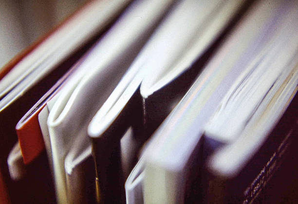 Stack Of Books Over White Background
