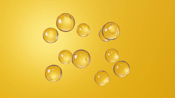 istock 3D Illustration.Transparent, beautiful spherical liquid on a golden background. Multiple. (Horizontal) 2237473951