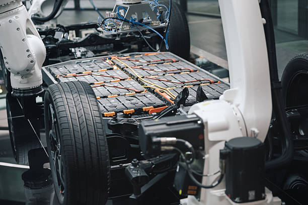 istock exposed ev battery pack on vehicle platform with robotic installation 2237475850
