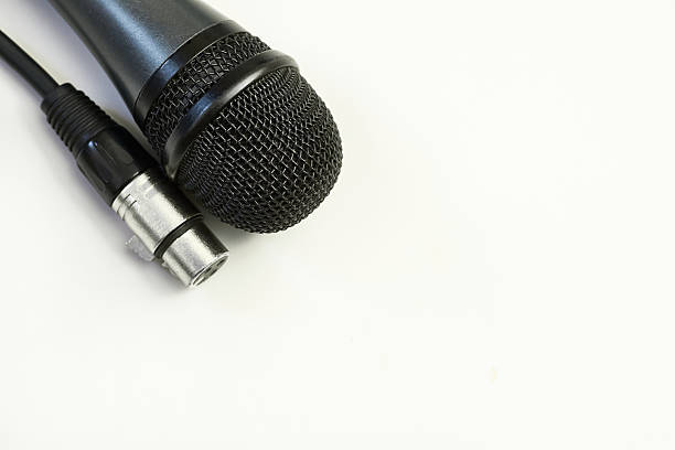 istock Karaoke.Vocal microphone black cable with connectors XLR canon,jack 2237479674