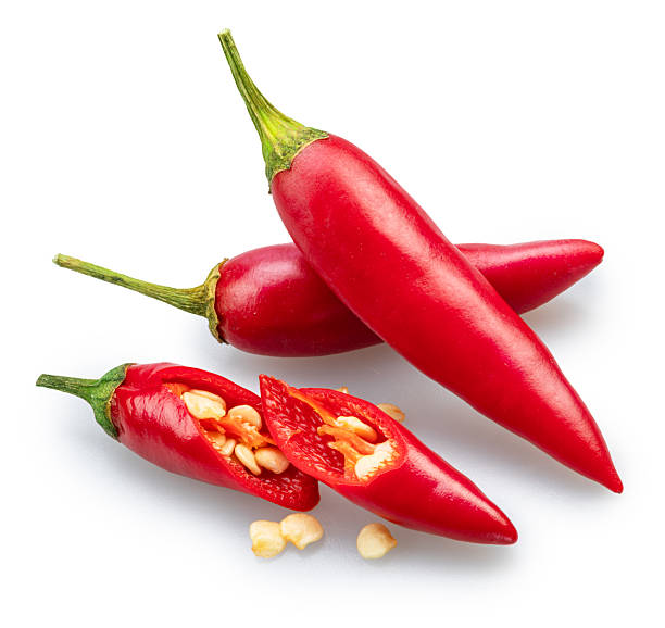istock Fresh red chilli peppers and chilli slices and seeds isolated on white background. File contains clipping paths. 2237480460