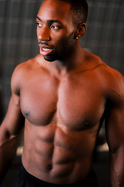 Defined muscular upper torso - young long haired male model