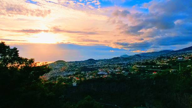 istock cityscape at sunset with colorful sky, 2237489616
