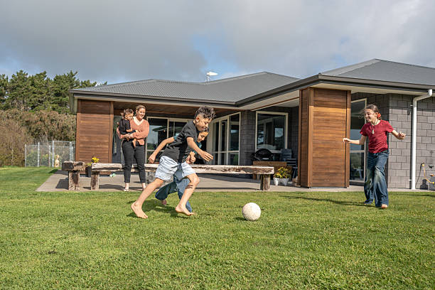 istock Children Playing Soccer in Backyard 2237490003
