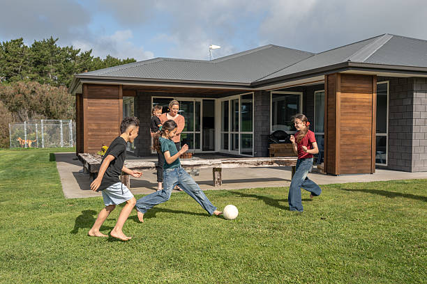 istock Children Playing Soccer Together in Backyard 2237490021