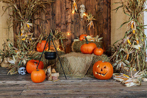 istock Jack o lantern pumpkin on wooden background for Halloween, holiday backdrop 2237496224