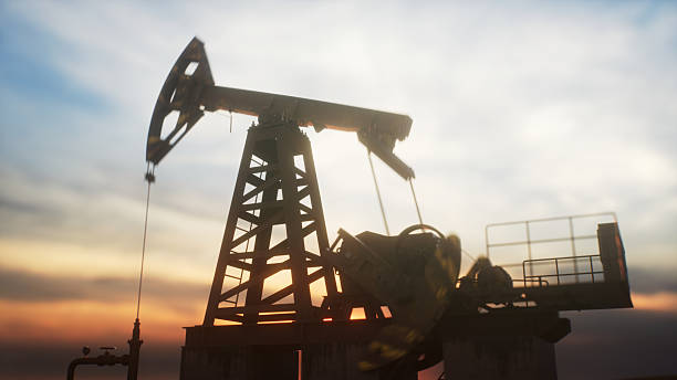 istock Oil pump jacks at sunset 2237498001