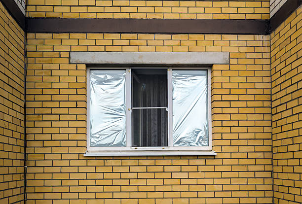 istock Residential window with reflective film applied 2237499296