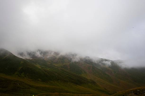 istock Serene mountain landscape in mist 2237516840