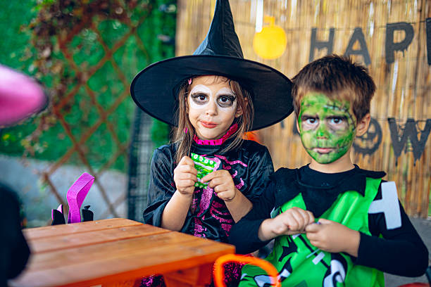 istock Kids sitting together during Halloween celebration 2237517799