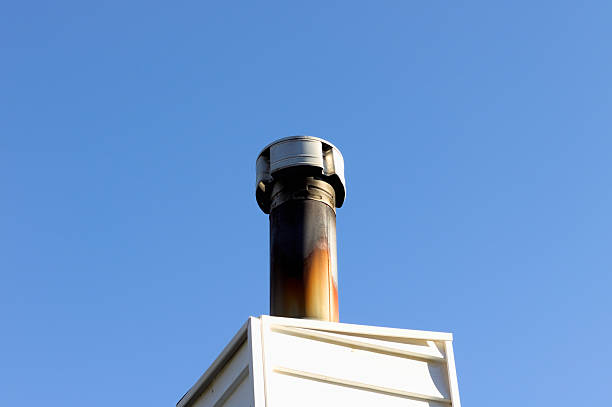 istock Urban Architecture: A Cozy Chimney On A Modern Building. 2237518344