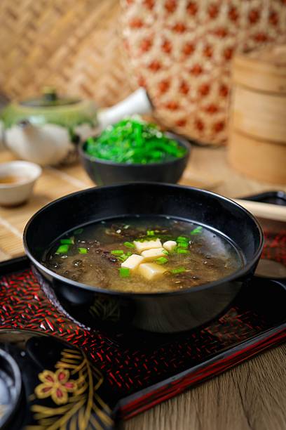 miso soup in black bowl