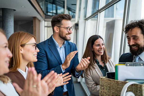 istock Business people clapping celebrating success and achievement 2237519229