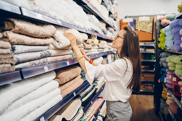istock A young woman choosing things in a store 2237519687