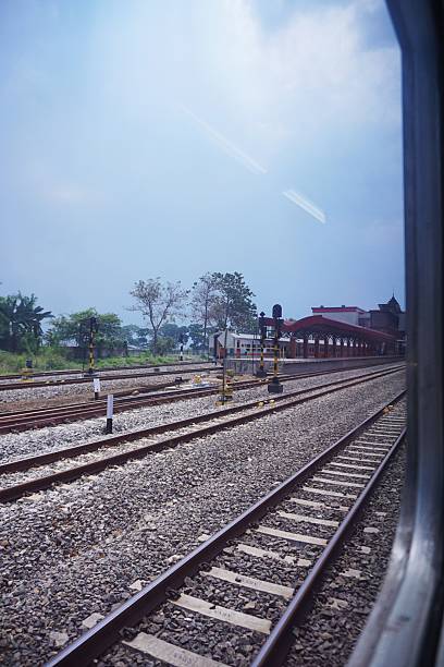 bandung Indonesia - September 25, 2025 View of a train platform from a train window in rural Indonesia
