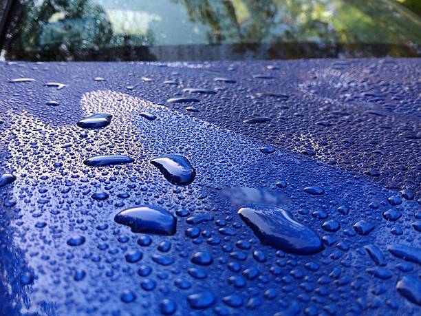 istock Water beads on clean car hood with windshield 2237522285