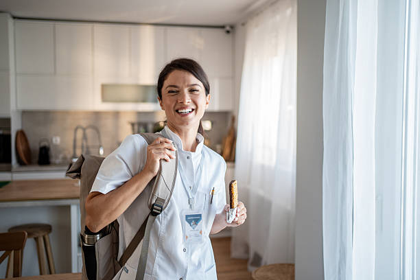 istock Woman nurse smiling going to work eating a snack 2237526913