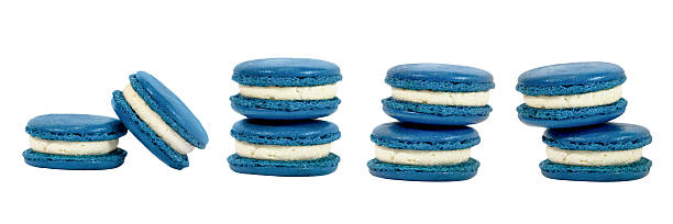 Delicious Macarons: A close-up captures a vibrant display of freshly made, colorful macarons, offering a delectable treat and a feast for the eyes, promising a symphony of flavors in every bite.