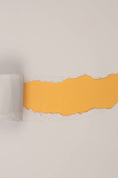 istock Torn, ripped paper pieces hole frame. White gray, Yellow gold, glow copy space texture background 2237536716