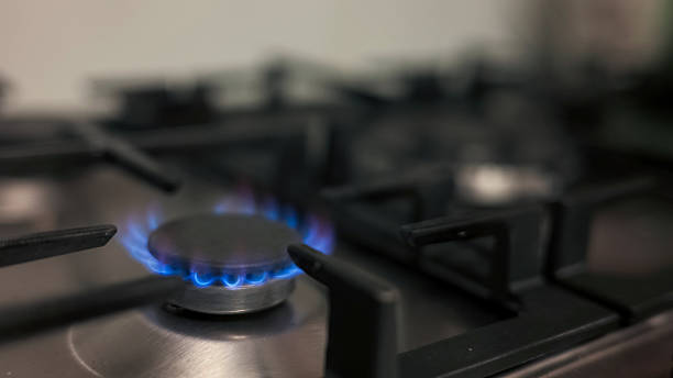 istock Flames dancing on a gas stove burner 2237541060