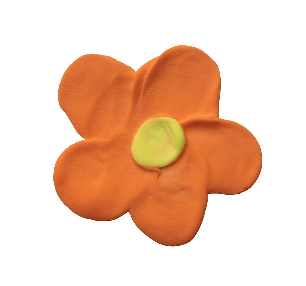Natural beige, brown shape flower piece of plasticine, modelling clay handmade texture frame on white background