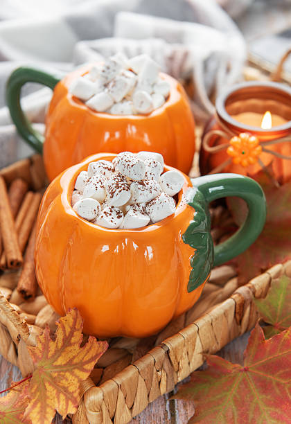 istock Pumpkin mugs with hot chocolate for autumn cozy warmth 2237551507