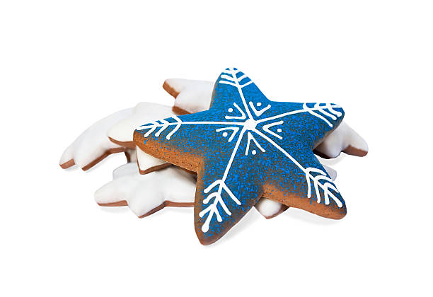 istock Christmas ginger star shaped cookie with blue icing is on set white cookies. 2237551711