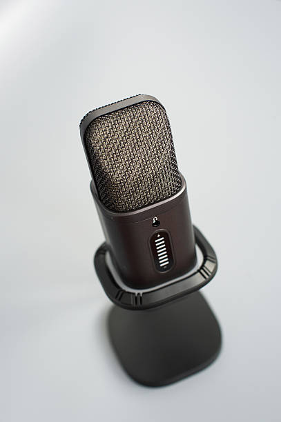 istock Close-up of modern black studio microphone on stand 2237553571