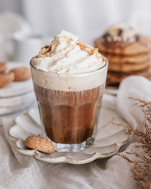 Coffee with whipped cream and crushed cookies