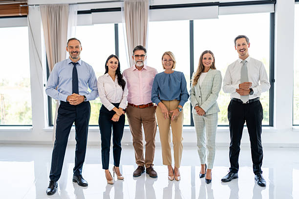 istock Business team standing together in a modern office 2237556145
