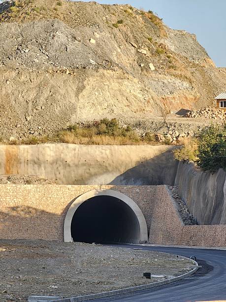 istock Construction of road tunnel under the mountain and hill. 2237556643