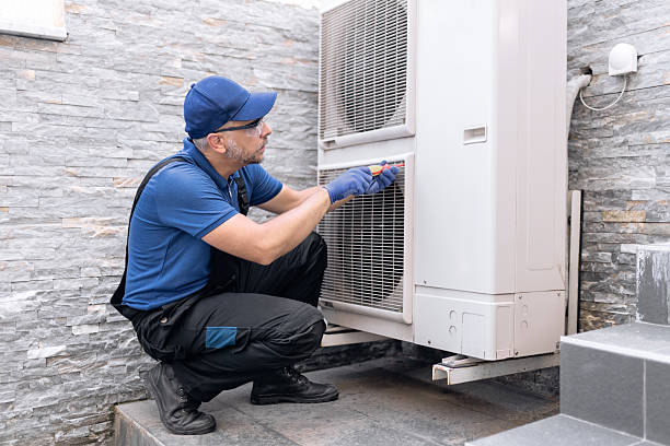 istock Repairman fixing AC outdoor unit. 2237557101
