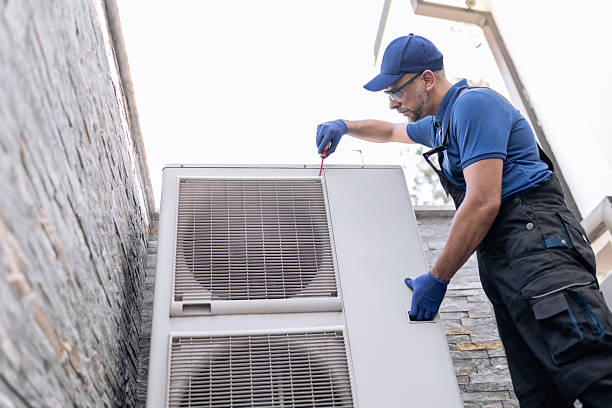 istock Repairman fixing AC outdoor unit. 2237557135